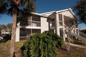 Building Photo - 2 Bedroom / 2 Bathroom Upstairs Condo with Large Screened Covered Porch