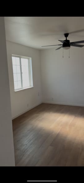 Main living room with ceiling fan - 101 I St