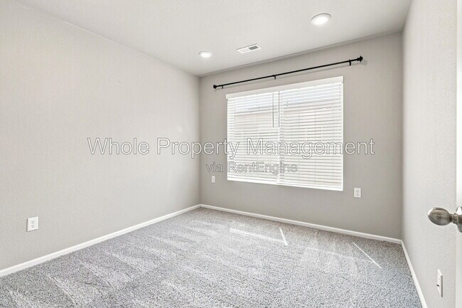 Building Photo - 12231 W 57th Dr