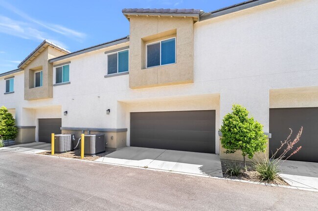 Building Photo - Modern Mosaic Townhome with Stylish Finishes & Resort-Style Community Amenities!