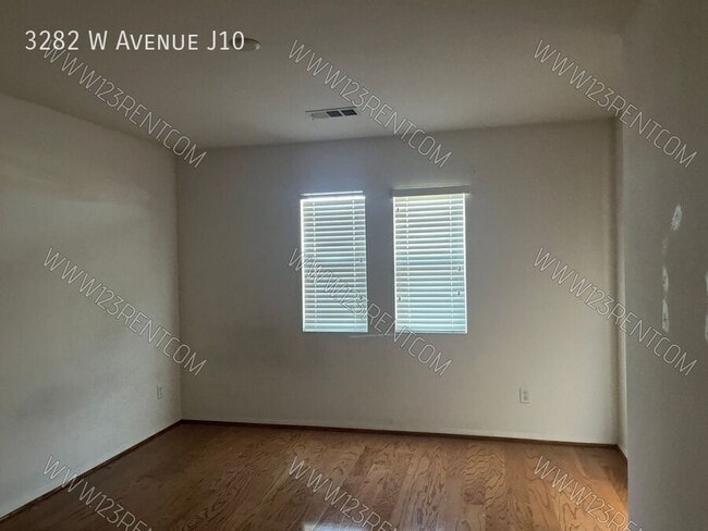 Building Photo - 3282 W Ave J 10