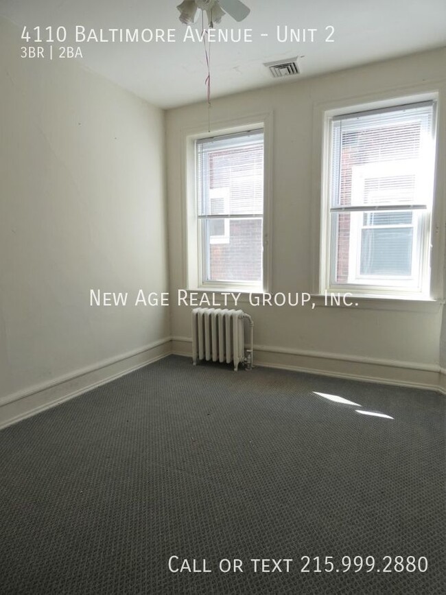 Building Photo - Sunny apartment available in University City!