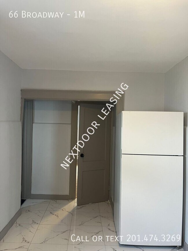 Building Photo - 66 Broadway-1M