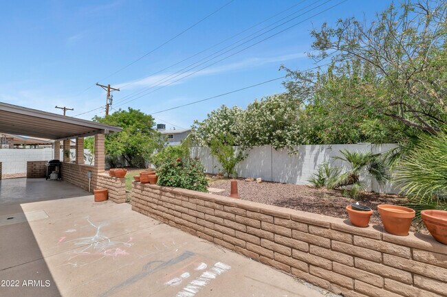 Building Photo - 8444 E Plaza Ave