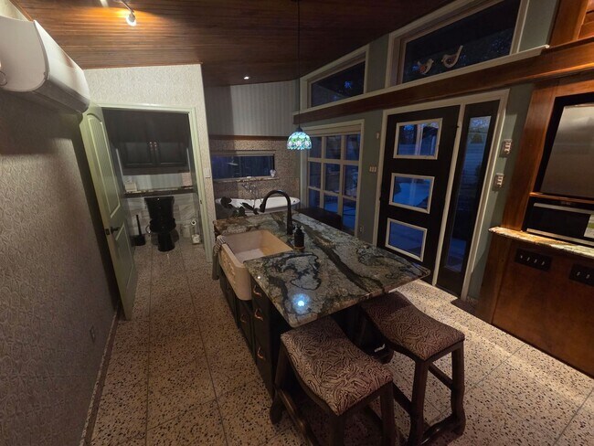 Building Photo - Custom built condo! Country Living! Offered unfurnished OR furnished!