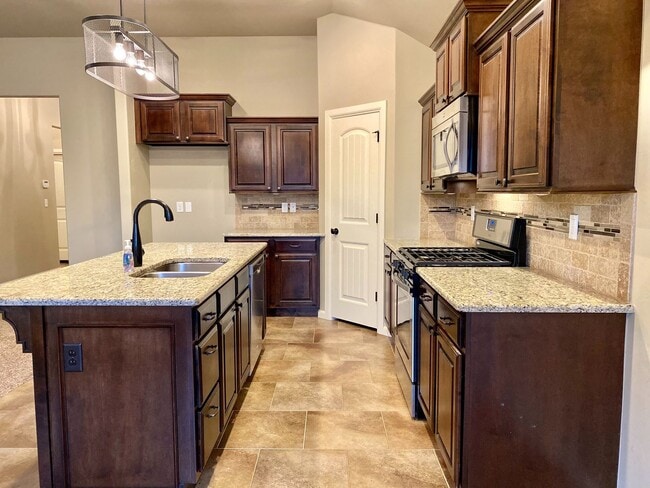 Building Photo - Cute Home In Mustang Schools With Storm Sh...
