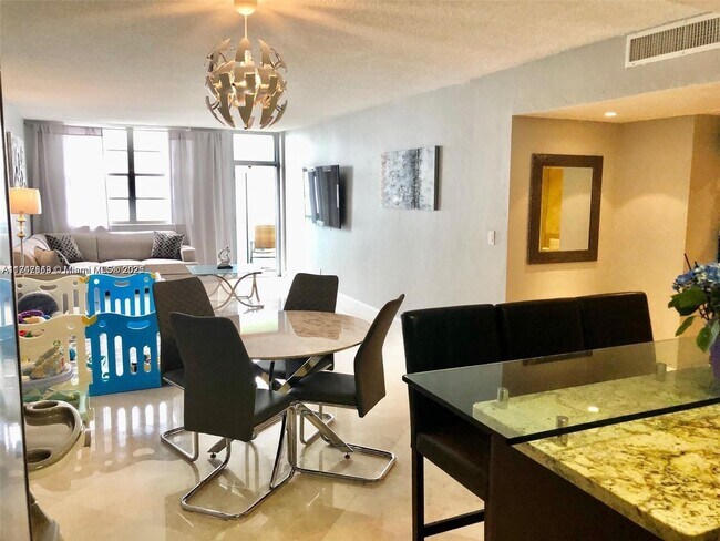 Building Photo - 19390 Collins Ave