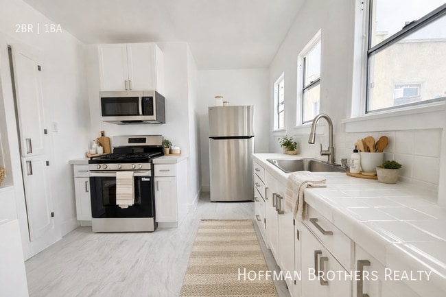 Building Photo - 4850 1/2 Mascot St -