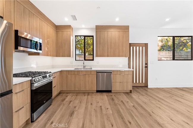 Building Photo - 7663 Maestro Ave