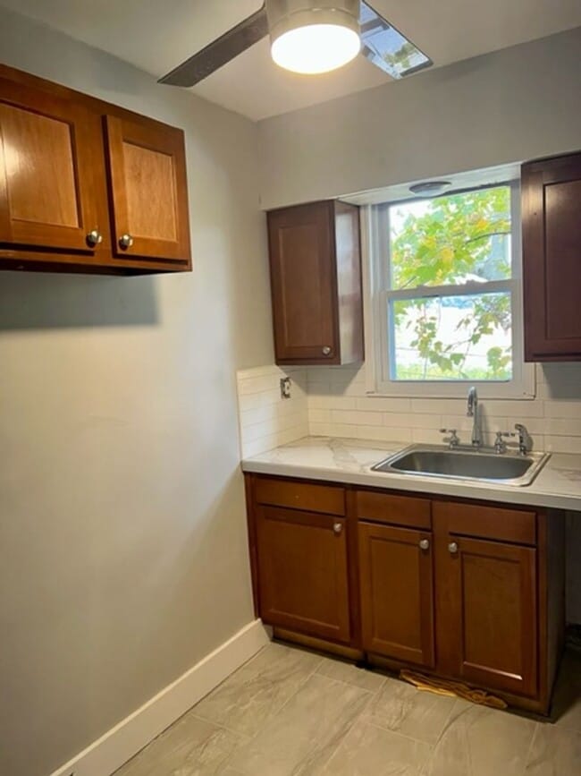Building Photo - 7431-7437 Penfield Ct