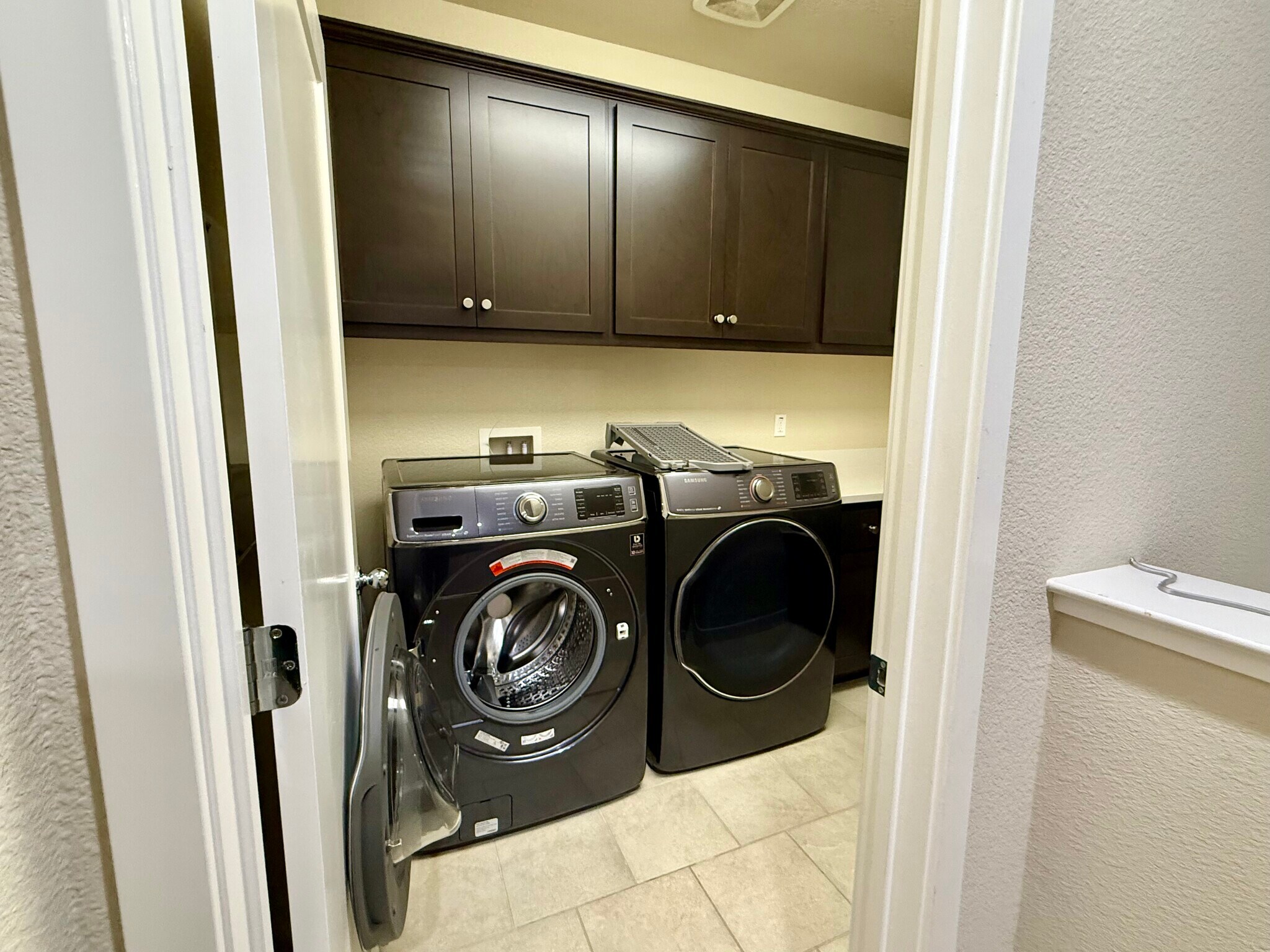 Laundry on second level with the bedrooms! Lot of storage. - 27 Rogers Ln