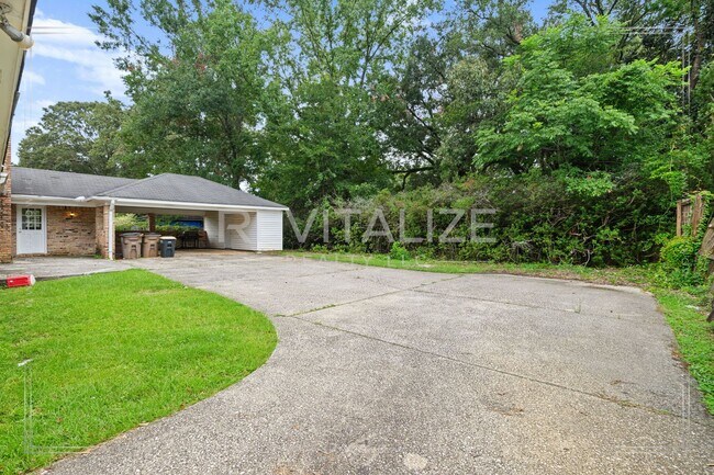 Building Photo - Spacious 4BR/2.5BA West Mobile Home – Room to Grow in a Convenient Location!