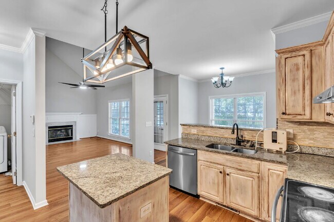 Building Photo - Beautifully Appointed 4BR Home Featuring a Screened Porch, Spacious Living Areas & Community Pool...