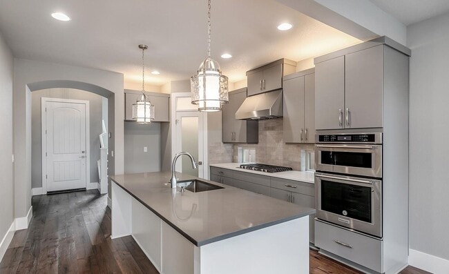 Building Photo - Bethany Stunner - 5 Bedrooms with Main-Level Bed & Bath, Modern Kitchen & Private Fenced Yard