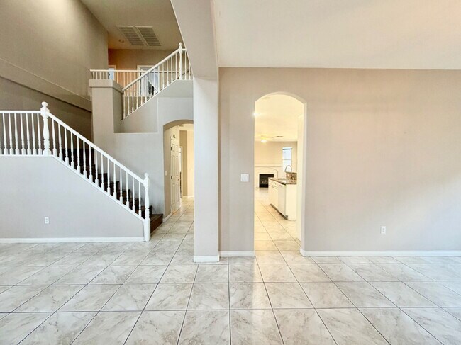 Building Photo - GATED SUMMERLIN HOME | 5 BEDROOM + DOWNSTAIRS DEN | 3-CAR GARAGE