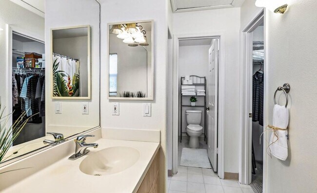 Building Photo - Single Story with large covered patio. Two car garage with uncovered gated parking stall. New vin...