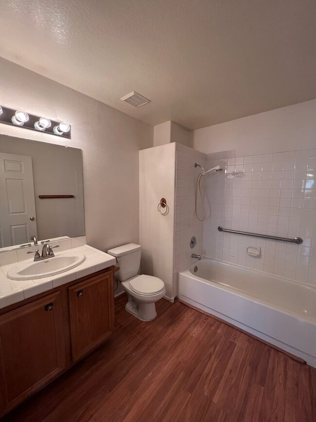 Building Photo - TWO BEDROOM CONDO WITH TWO CAR GARAGE IN H...