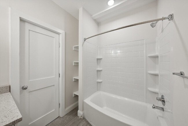 Building Photo - "NEW CONSTRUCTION Urban Living: Spacious 4...