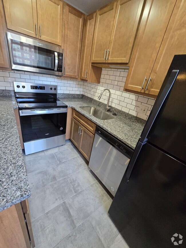 Building Photo - Beautifully renovated TWO-bedroom Condo on...