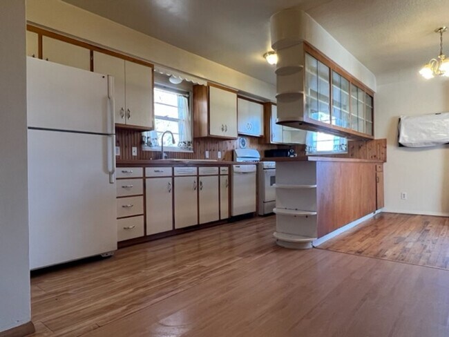 Building Photo - Bi-Level House w/ Massive Backyard, Storage, & Character!