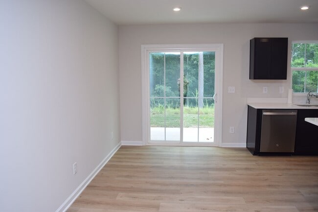 Building Photo - Modern 3-Bedroom Townhouse with Garage & Private Patio