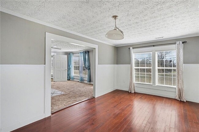 Building Photo - 707 E Mcintosh Rd