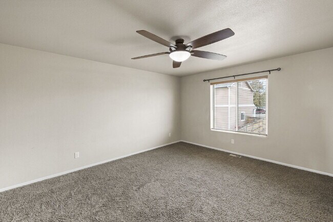 Building Photo - Spacious 4-Bedroom Home with Loft, Solar & Fenced Backyard