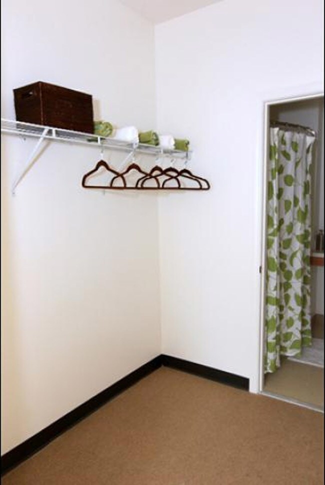Spacious Walk-Through Closet - Continuum Apartments