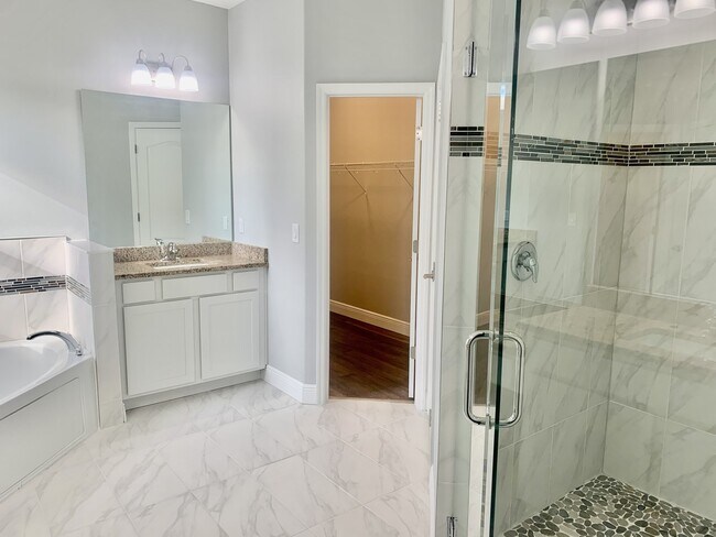 Building Photo - "Spacious 4-Bedroom 3-Bath with In-Law Suite & Granite Finishes in Palm Bay!"