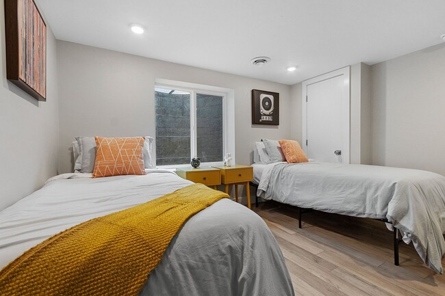 Building Photo - FURNISHED RENTAL: New Mid-Century Mod on M...