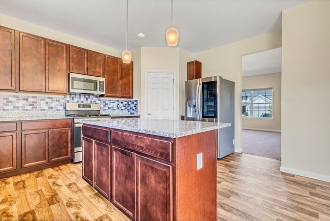 Building Photo - COMING SOON - Modern, Spacious Home in the Orchard Farm School District!