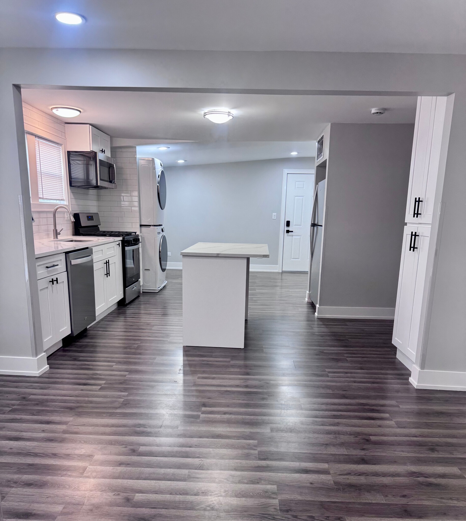 Kitchen/Living Room View 1 - 4909 W Wellington Ave