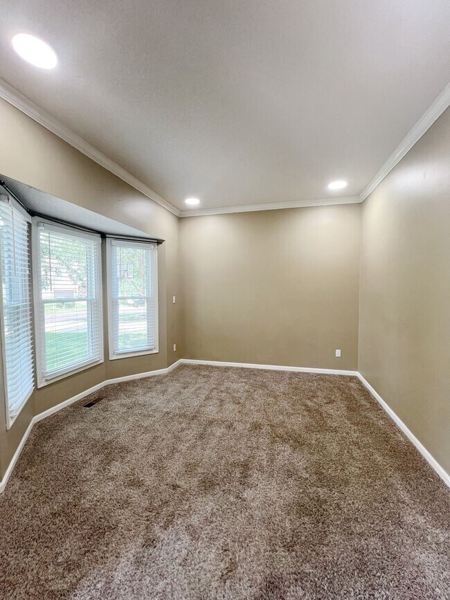 Building Photo - SEE IT NOW: Spacious 4-Bed Home with Finis...