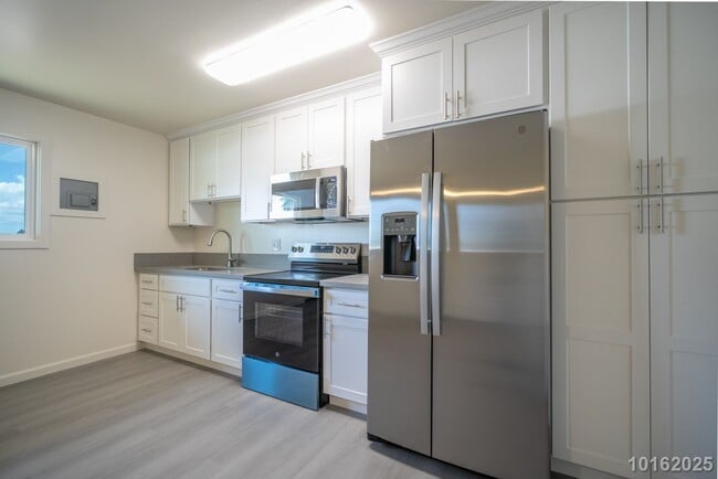 Building Photo - Immaculate, Renovated 1BR/1BA/1 compact pk...