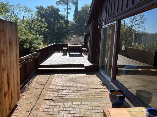 Patio and deck with mountain view. - 2021 Rosilla Pl