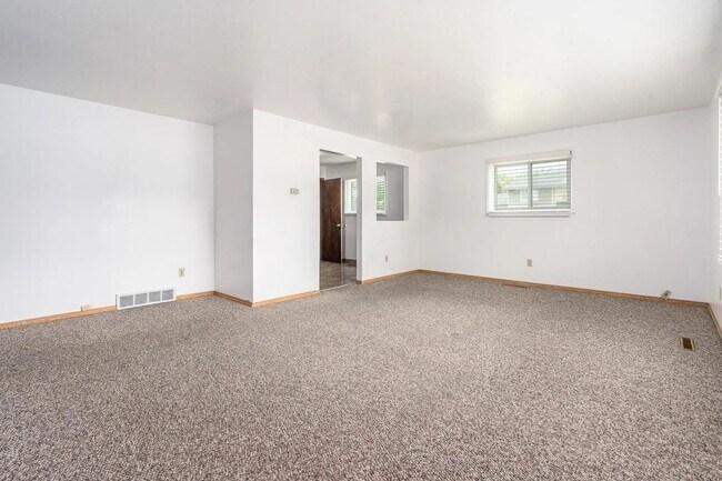 Building Photo - Beautiful 4-Bedroom Home with Finished Bas...
