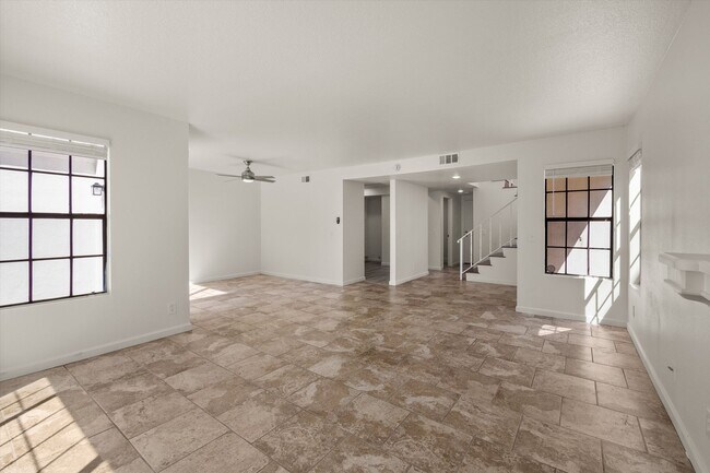 Building Photo - Large Renovated 3bed x 2.5bath Townhouse with Private Patio & 2-Car Garage