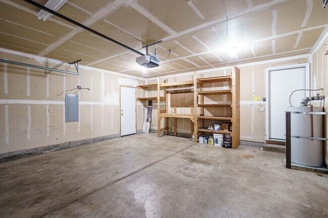 Building Photo - Recently Updated with Wood Laminate Flooring and Fresh Paint