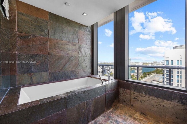 Building Photo - 5875 Collins Ave