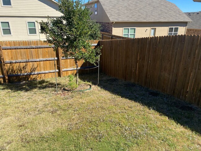 Building Photo - Three Bedroom, Two Bath, Two Car Garage, Washer and Dryer are included.