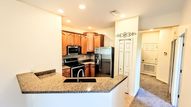 Building Photo - Annual unfurnished-3 bedroom, 2 bath condo with garage in gated community!