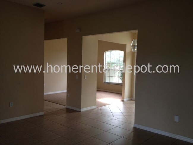 Building Photo - Gorgeous 4/3 pool home in the sought-after...