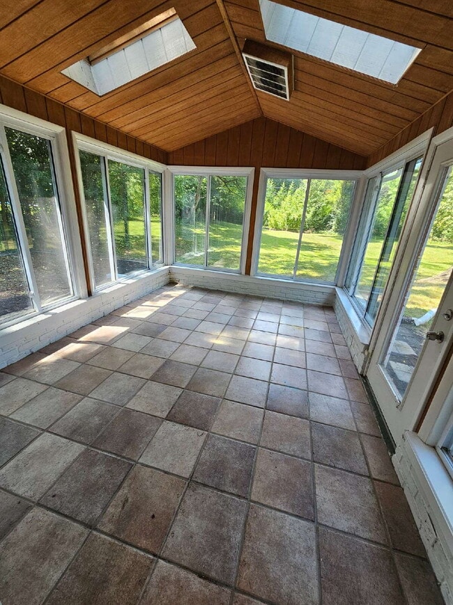 Building Photo - Private 4 Bedroom Home on 0.75 Acres with Great Room Fireplace, Wet Bar & 3-Season Room, 2 Car At...