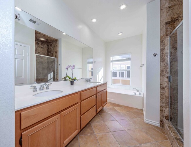 Building Photo - Stunning Upgraded Tri-Level Condo in South Coast Metro’s Exclusive Vantage Community