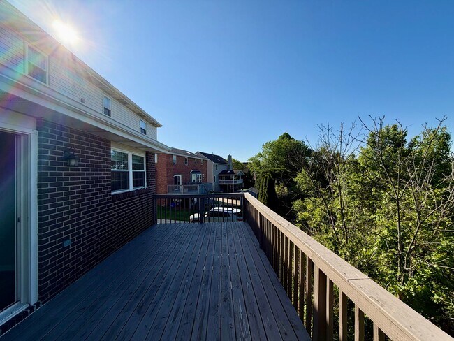 Building Photo - Modern Comforts Await: Spacious Rental with 2-Car Garage, Private Office, and Finished Basement w...