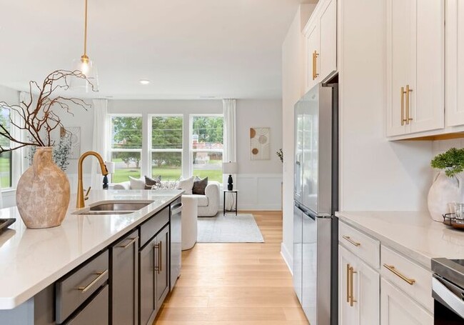 Building Photo - FREE RENT! Stunning 4 Bed | 3.5 Bath Luxury Townhome at The Towns at Rocky River