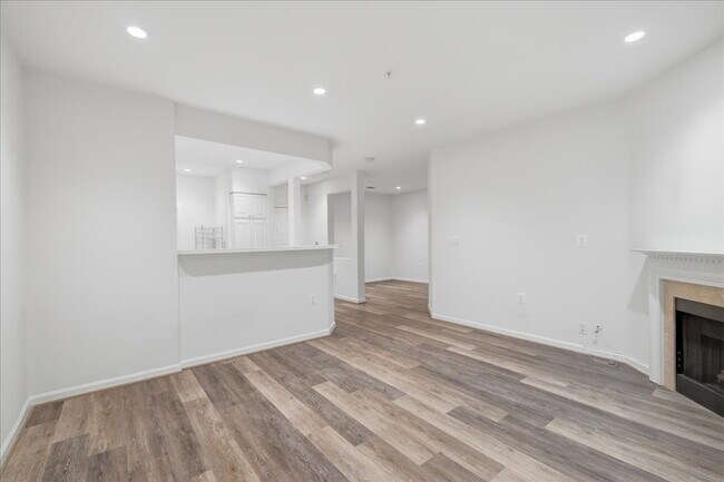 Building Photo - Commuter’s Paradise! Ground-Level 2BR Condo  Welcome home to this stunning, sun-filled 2-bedroom ...