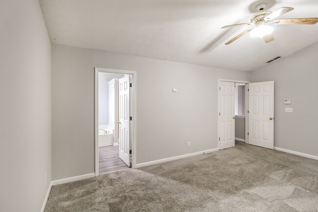 Building Photo - Home with Soaring Ceilings