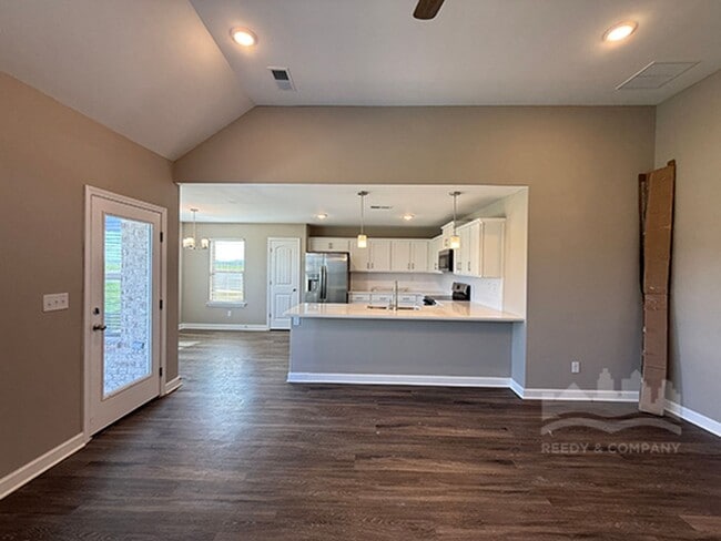Building Photo - Welcome to this spacious 4 bedroom, 3 bath...
