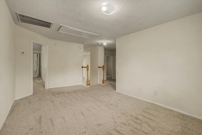 Building Photo - 10840 Sycamore Dr N